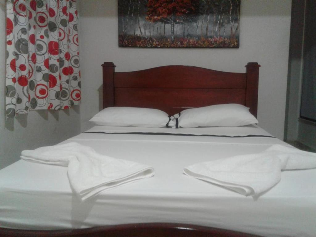 Postel nebo postele na pokoji v ubytování Hotel Sol y Mar