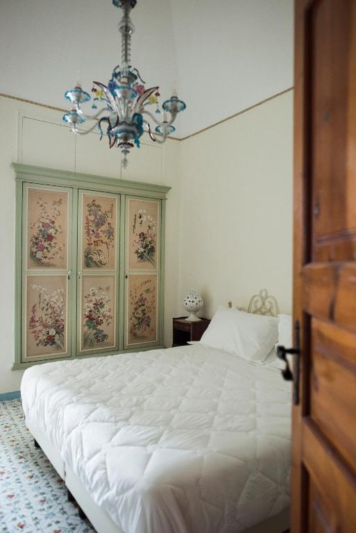 Postel nebo postele na pokoji v ubytování Villa delle Querce Resort