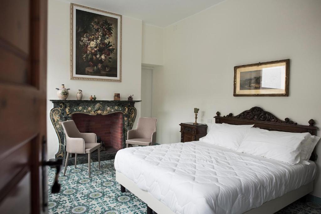 Ένα ή περισσότερα κρεβάτια σε δωμάτιο στο Villa delle Querce Resort