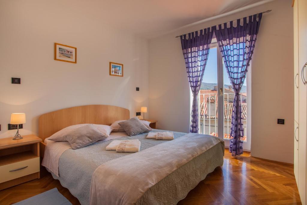 Posteľ alebo postele v izbe v ubytovaní Apartment Medak