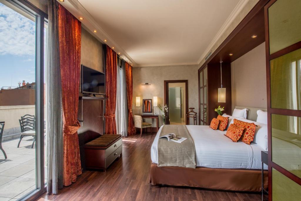 Posteľ alebo postele v izbe v ubytovaní Hotel Barcelona Center