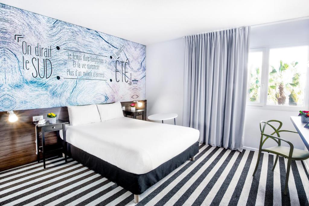 Postel nebo postele na pokoji v ubytování ibis Styles Perpignan Canet En Roussillon