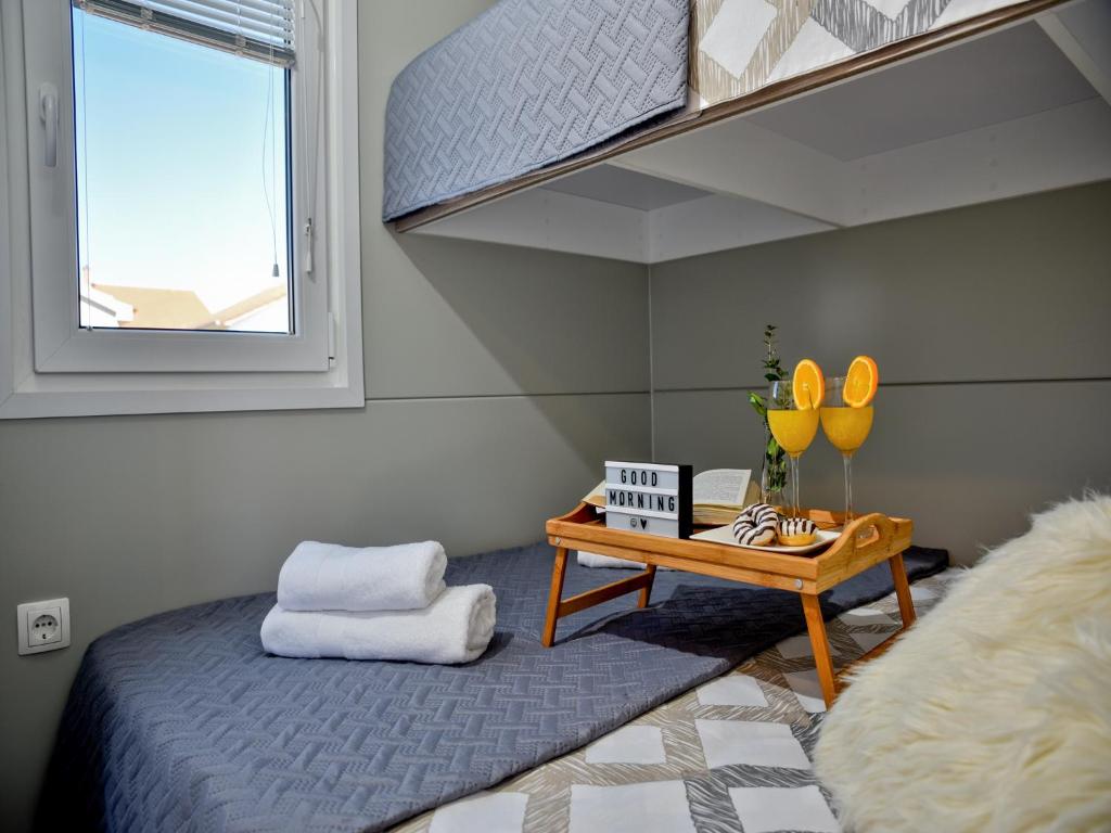 Postel nebo postele na pokoji v ubytování Luxury mobile home Maro Biograd
