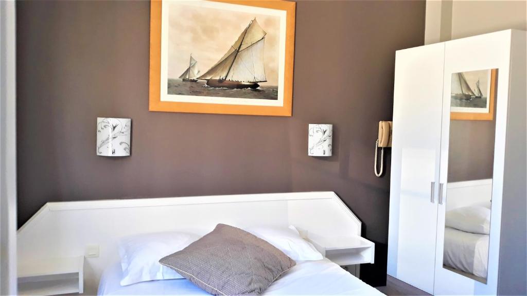 Postel nebo postele na pokoji v ubytování Hotel Le Reynita