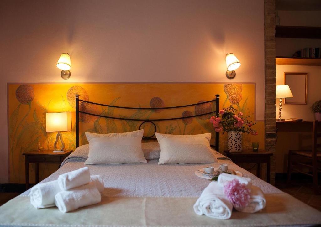 Letto o letti in una camera di Il Vecchio Mulino Toscana