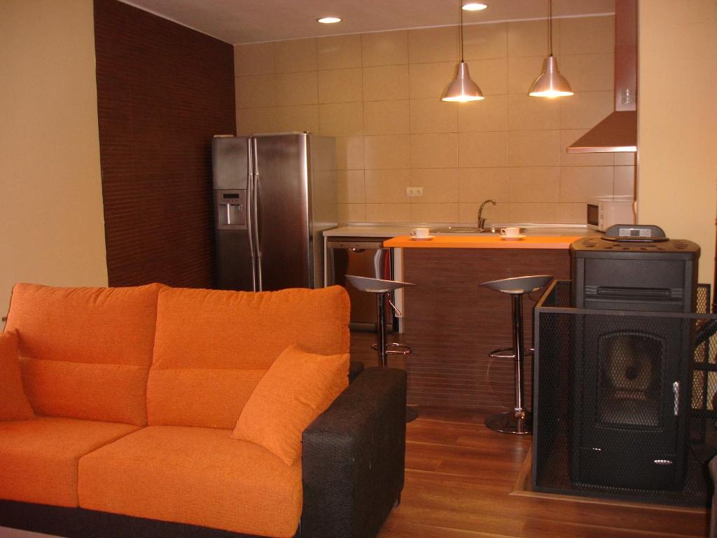 Kuchyň nebo kuchyňský kout v ubytování Apartamentos La Muralla