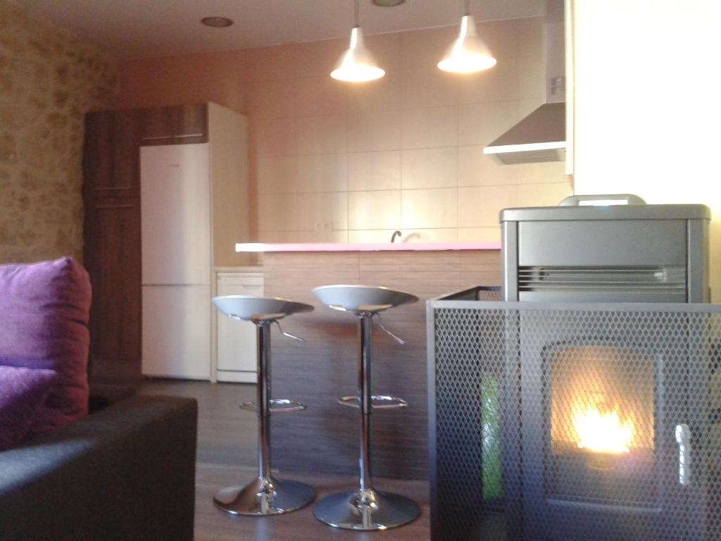 Kuchyň nebo kuchyňský kout v ubytování Apartamentos La Muralla