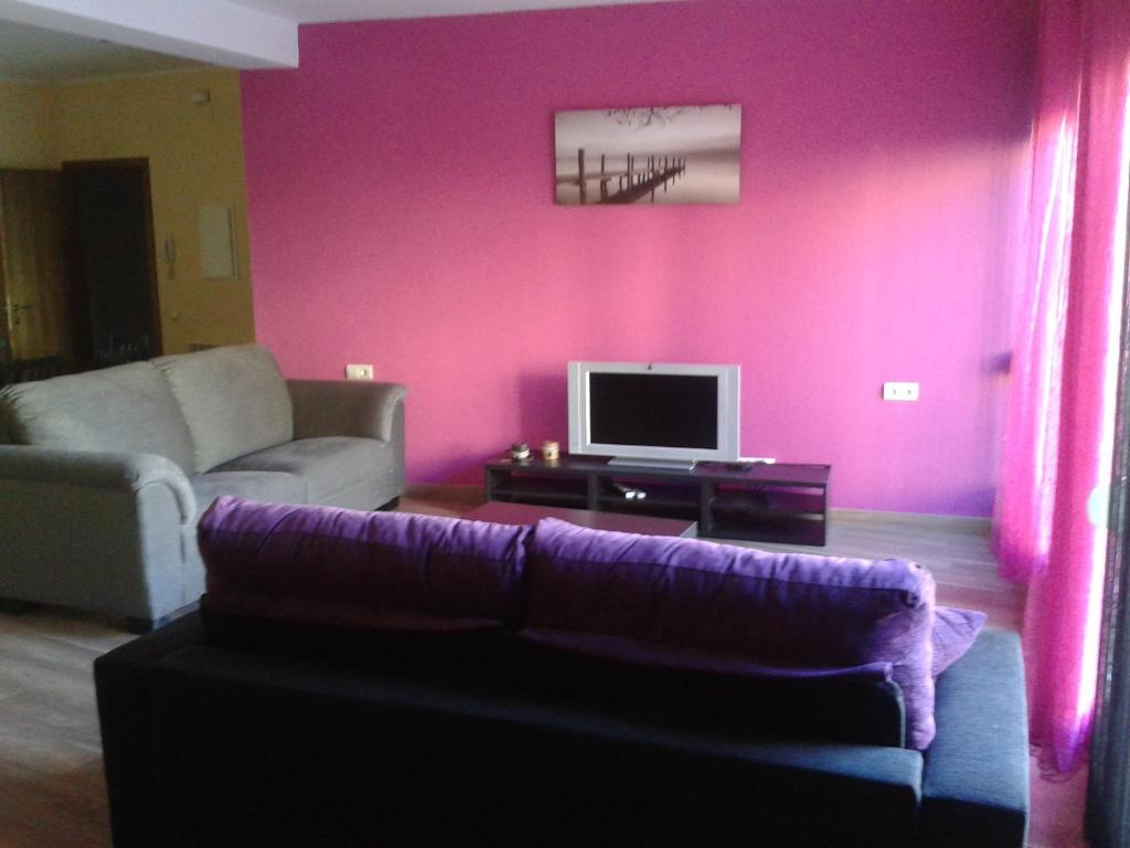 TV a/nebo společenská místnost v ubytování Apartamentos La Muralla
