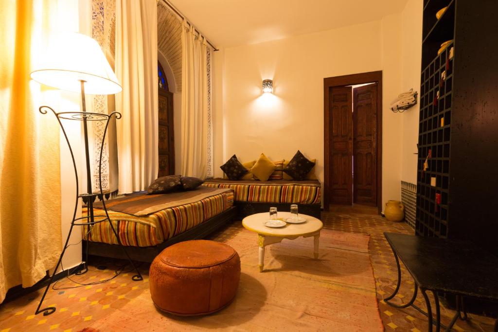 Postel nebo postele na pokoji v ubytování Riad El Ma