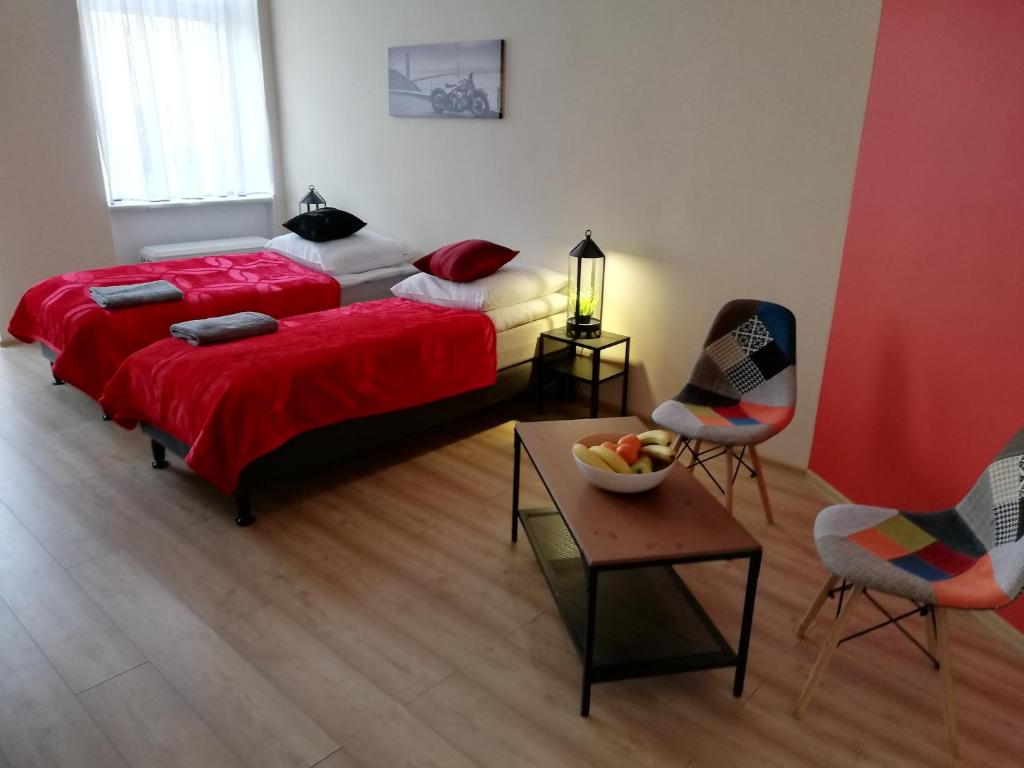 Posteľ alebo postele v izbe v ubytovaní Apartament Miarki