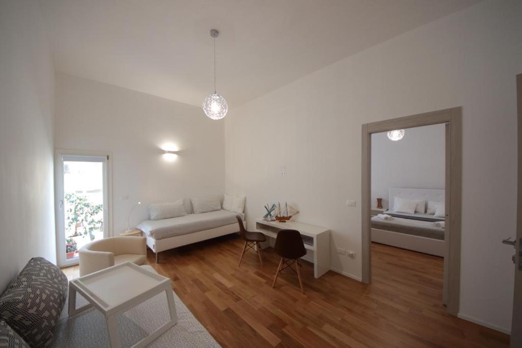 Postel nebo postele na pokoji v ubytování Meraki B&B