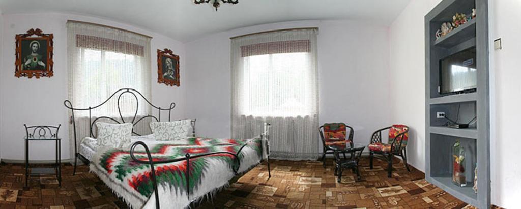 Postel nebo postele na pokoji v ubytování Садиба Там де гори