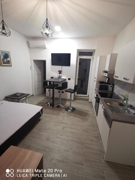 Kuchyň nebo kuchyňský kout v ubytování Apartment Toni
