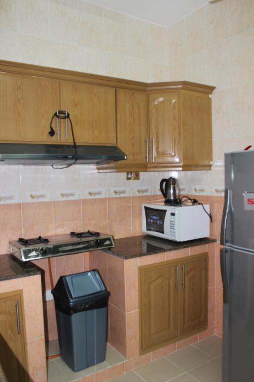 Köök või kööginurk majutusasutuses Gulf Crown Hotel Apartment
