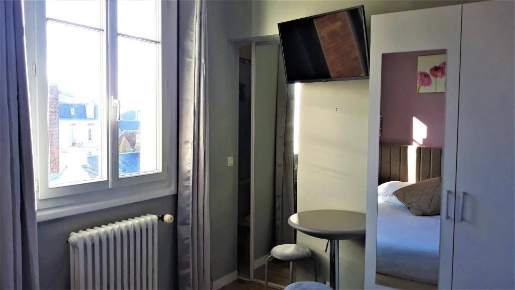Postel nebo postele na pokoji v ubytování Hotel Le Reynita