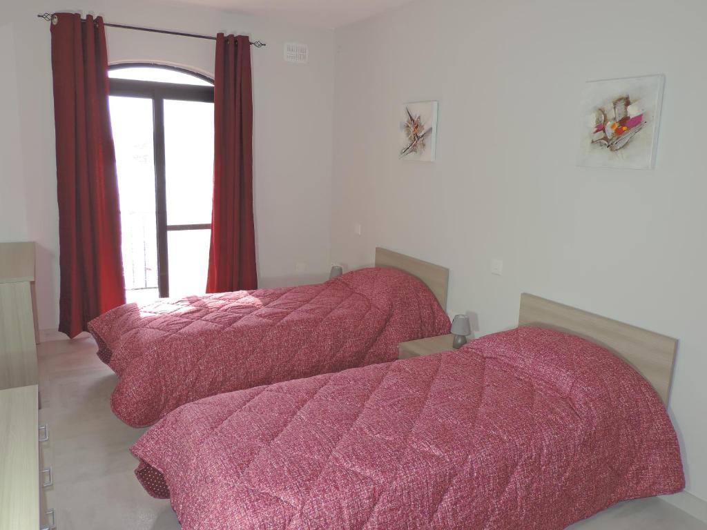 Postel nebo postele na pokoji v ubytování Antros, Apartment 1