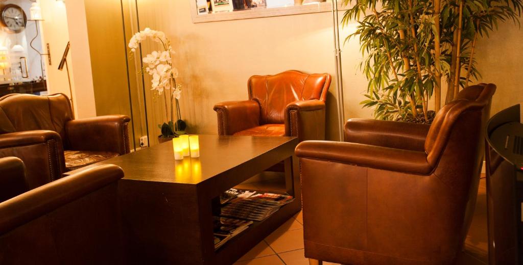 Posezení v ubytování Fletcher Hotel Restaurant Heidehof