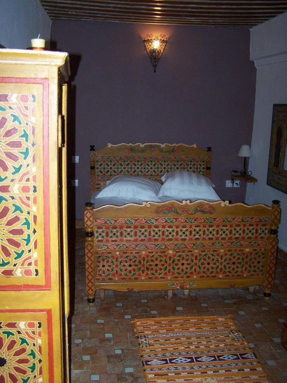 Postel nebo postele na pokoji v ubytování Riad Menthe Et Citron