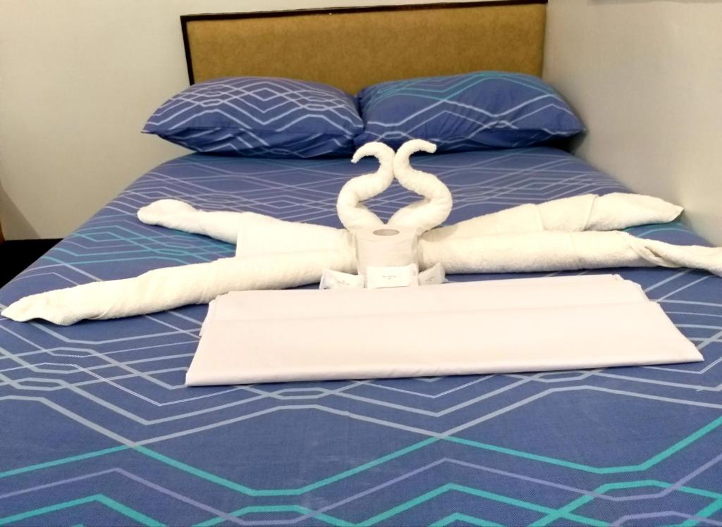 Postel nebo postele na pokoji v ubytování AMBIANZA APARTELLE