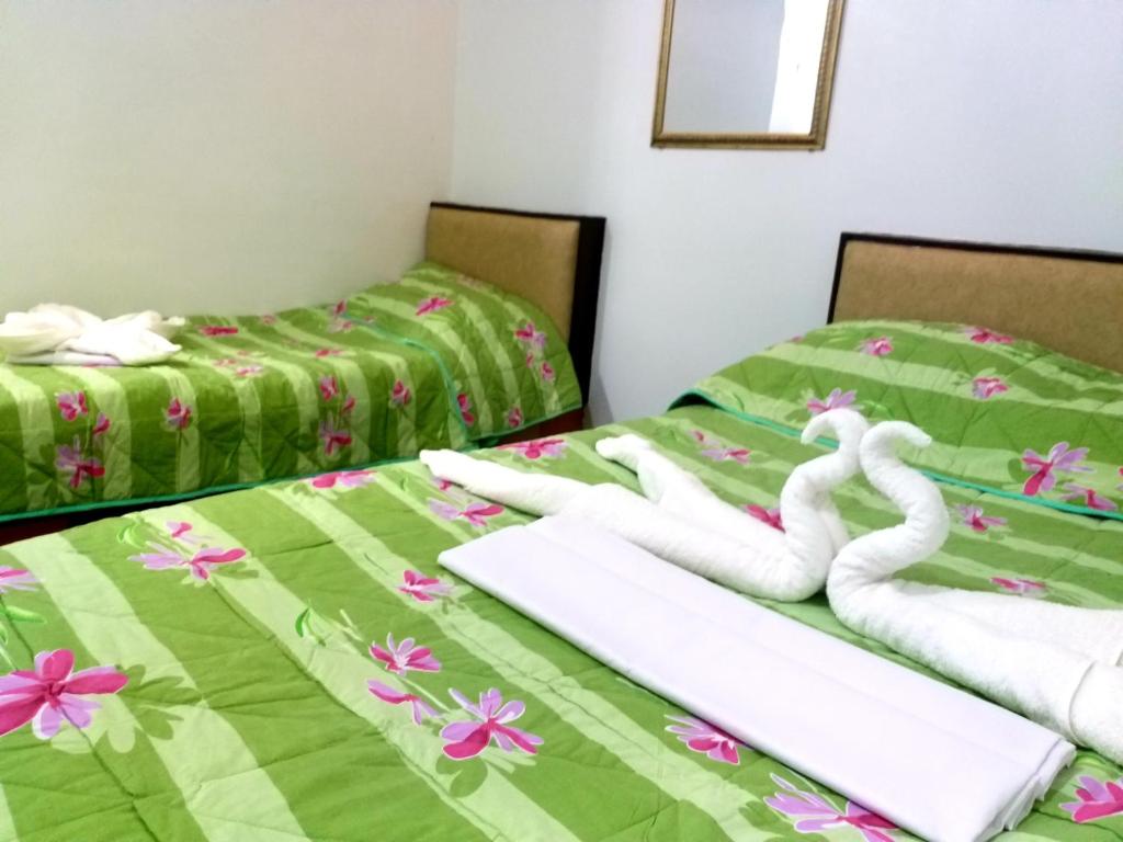 Postel nebo postele na pokoji v ubytování AMBIANZA APARTELLE
