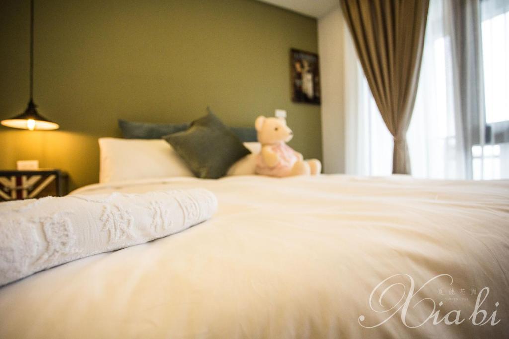 Postel nebo postele na pokoji v ubytování Xia Bi Garden Wedding B&B