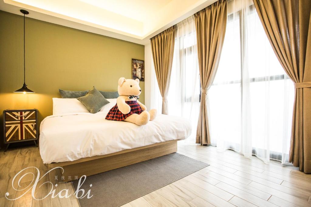 Postel nebo postele na pokoji v ubytování Xia Bi Garden Wedding B&B