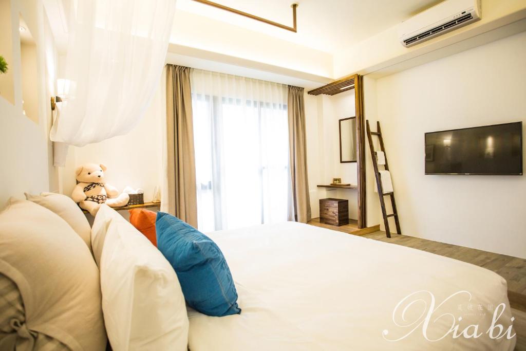 TV a/nebo společenská místnost v ubytování Xia Bi Garden Wedding B&B