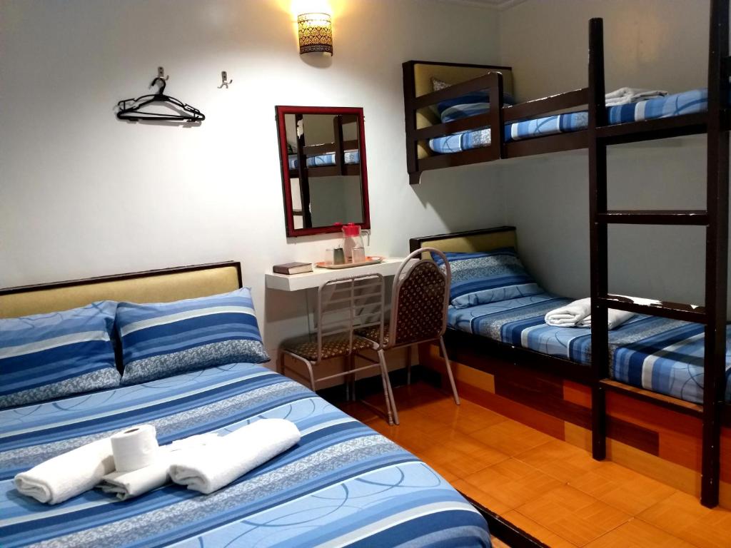 Postel nebo postele na pokoji v ubytování AMBIANZA APARTELLE