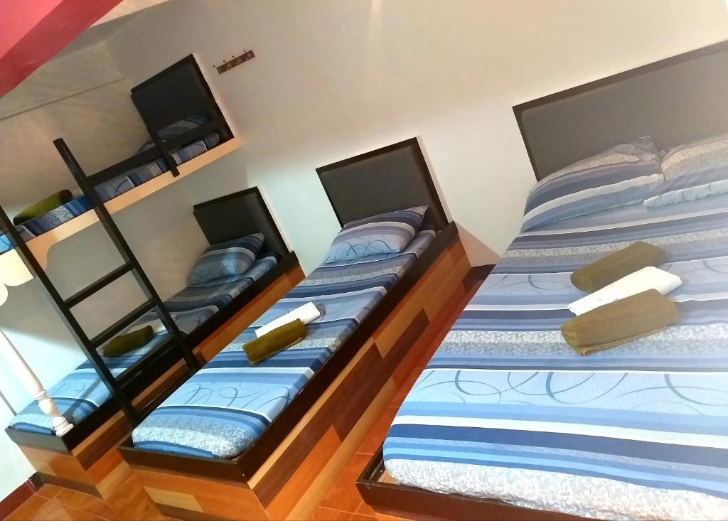 Postel nebo postele na pokoji v ubytování AMBIANZA APARTELLE