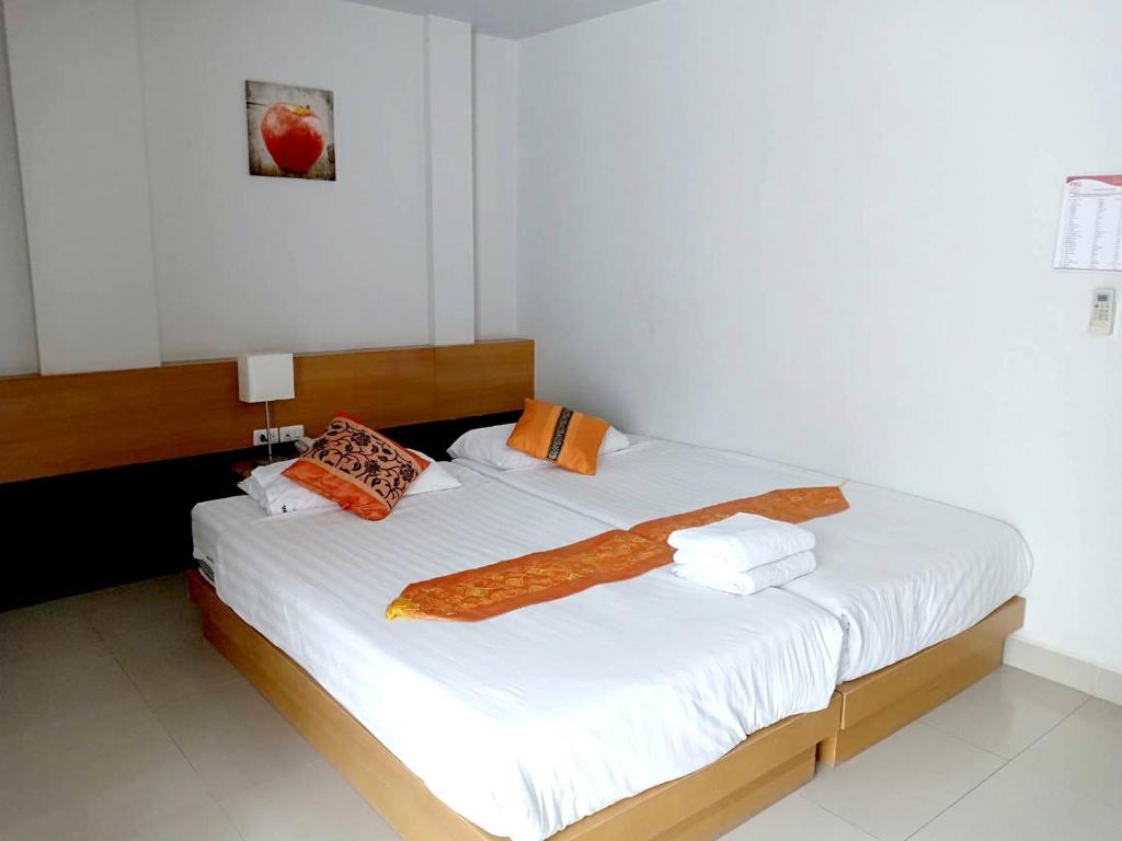 Postel nebo postele na pokoji v ubytování PKL Residence