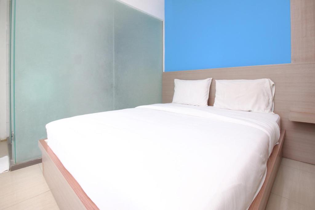 Postel nebo postele na pokoji v ubytování Residence100