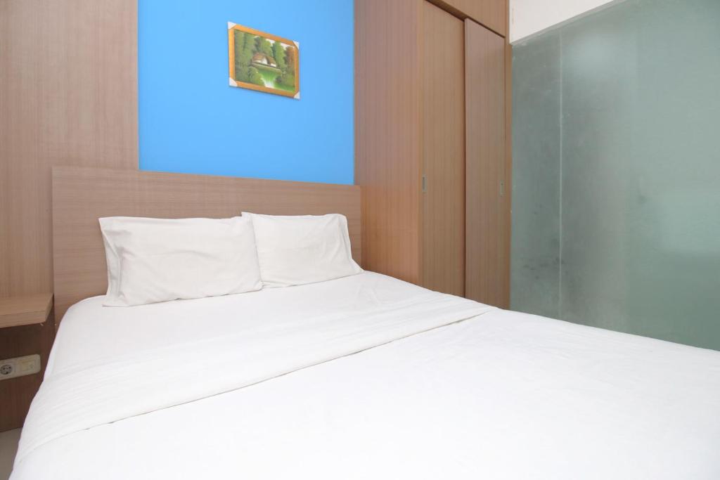 Postel nebo postele na pokoji v ubytování Residence100