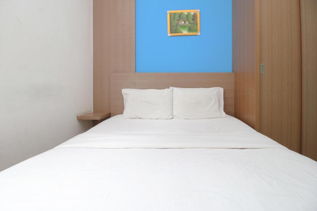 Postel nebo postele na pokoji v ubytování Residence100