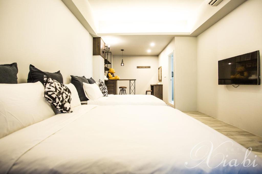 TV a/nebo společenská místnost v ubytování Xia Bi Garden Wedding B&B