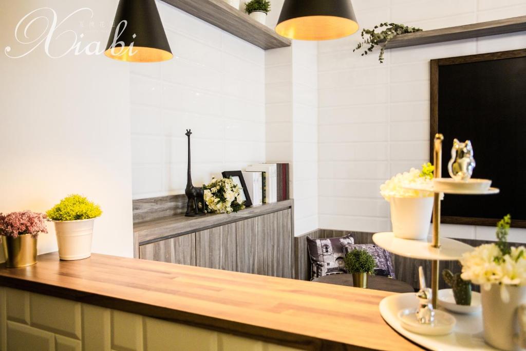 Příslušenství pro přípravu čaje a kávy v ubytování Xia Bi Garden Wedding B&B