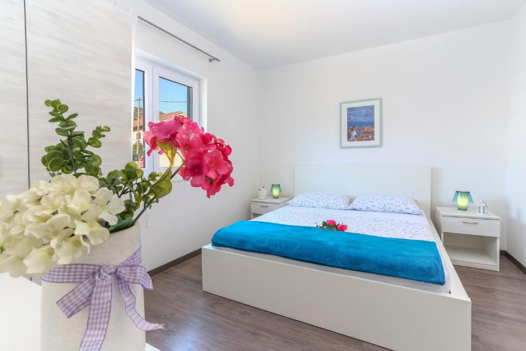 Postel nebo postele na pokoji v ubytování Guest House Kovacevic