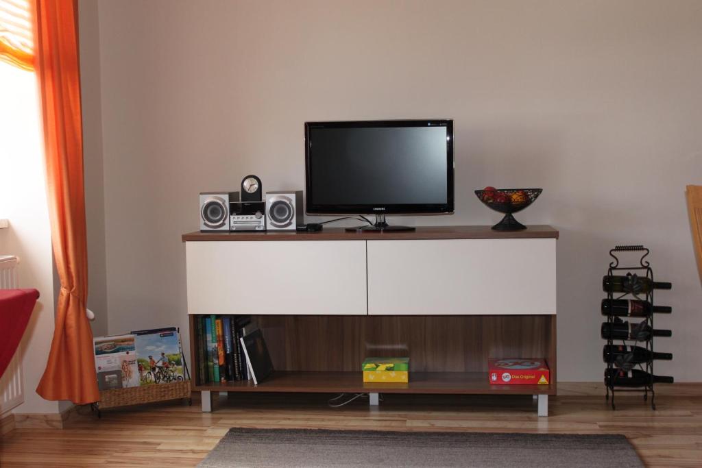 TV a/nebo společenská místnost v ubytování Gästehaus Anita