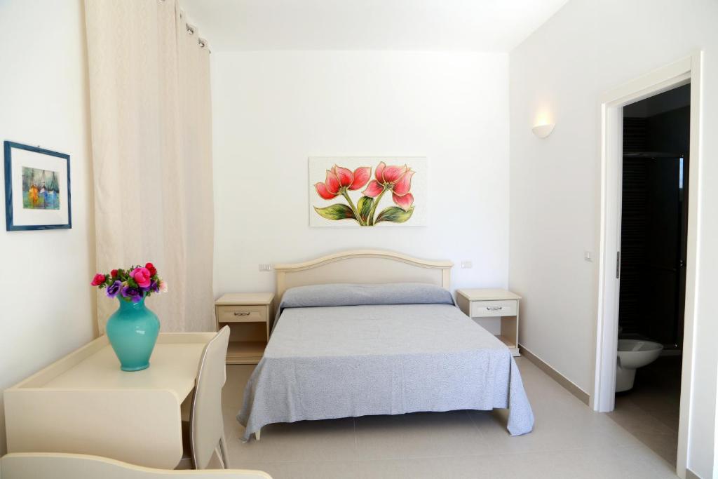 Postel nebo postele na pokoji v ubytování A CASA DI GIUSEPPE