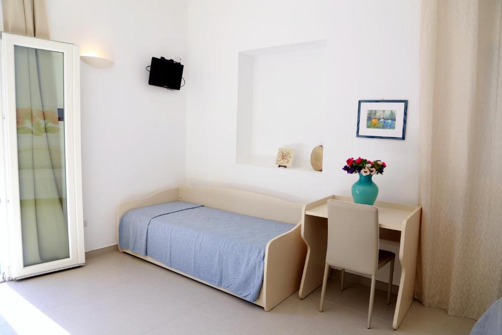 Postel nebo postele na pokoji v ubytování A CASA DI GIUSEPPE