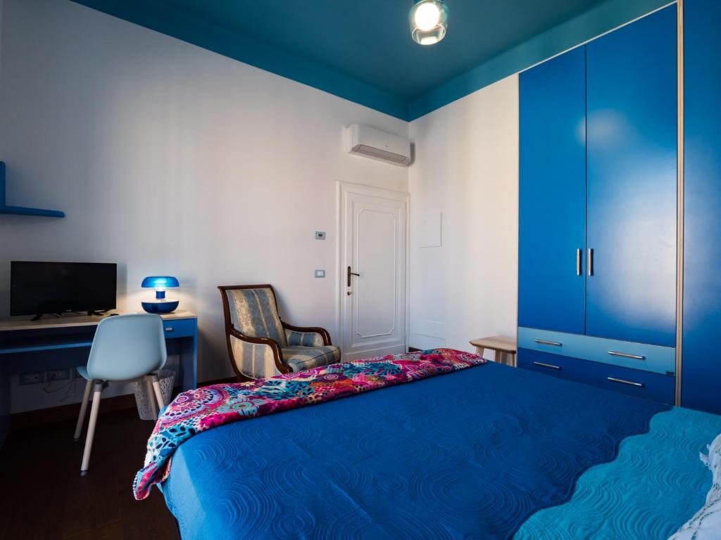 A bed or beds in a room at B&B VILLA TOZZA