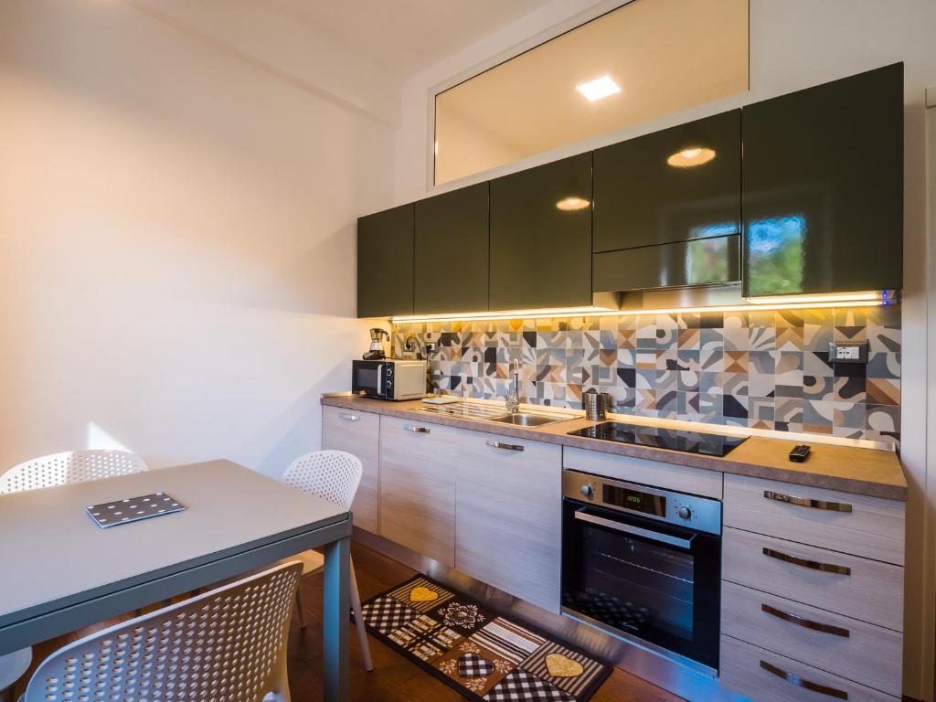 A kitchen or kitchenette at B&B VILLA TOZZA