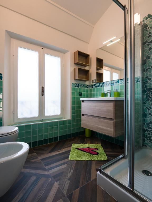 A bathroom at B&B VILLA TOZZA