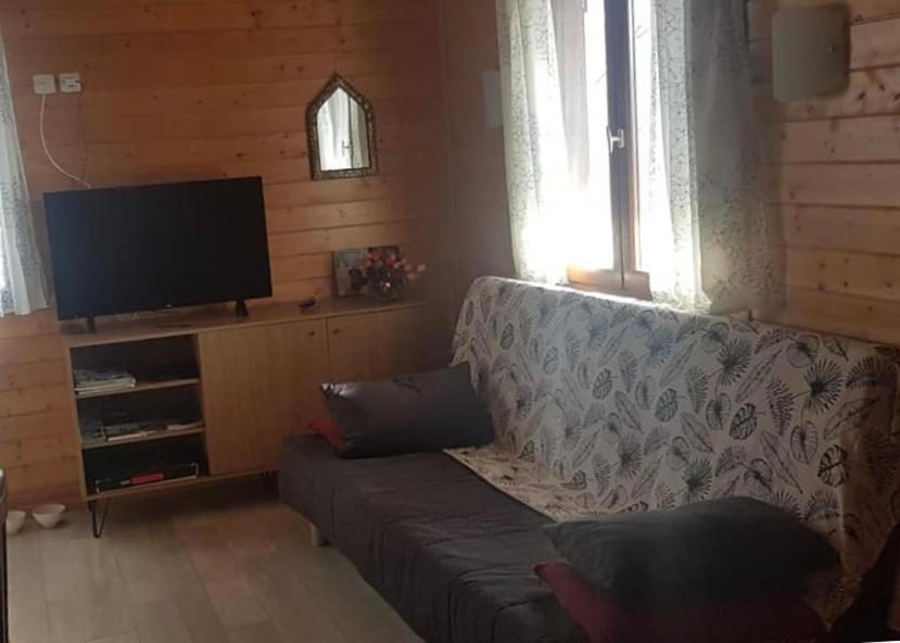 TV a/nebo společenská místnost v ubytování ISATIS 19