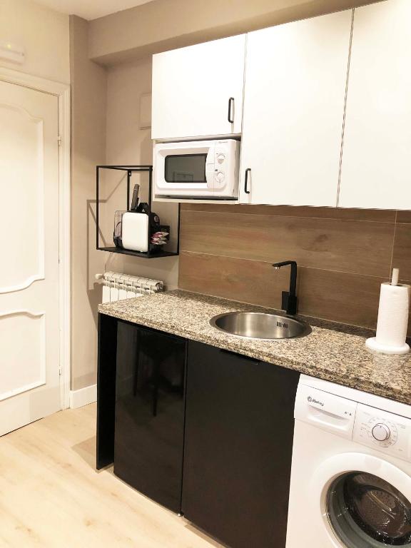 Kuchyň nebo kuchyňský kout v ubytování Apartamentos Las Vegas