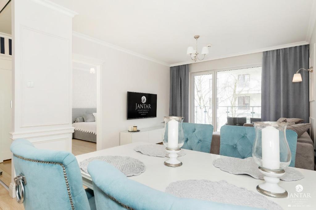 TV a/nebo společenská místnost v ubytování Jantar Apartamenty - Family Vacation Polanki