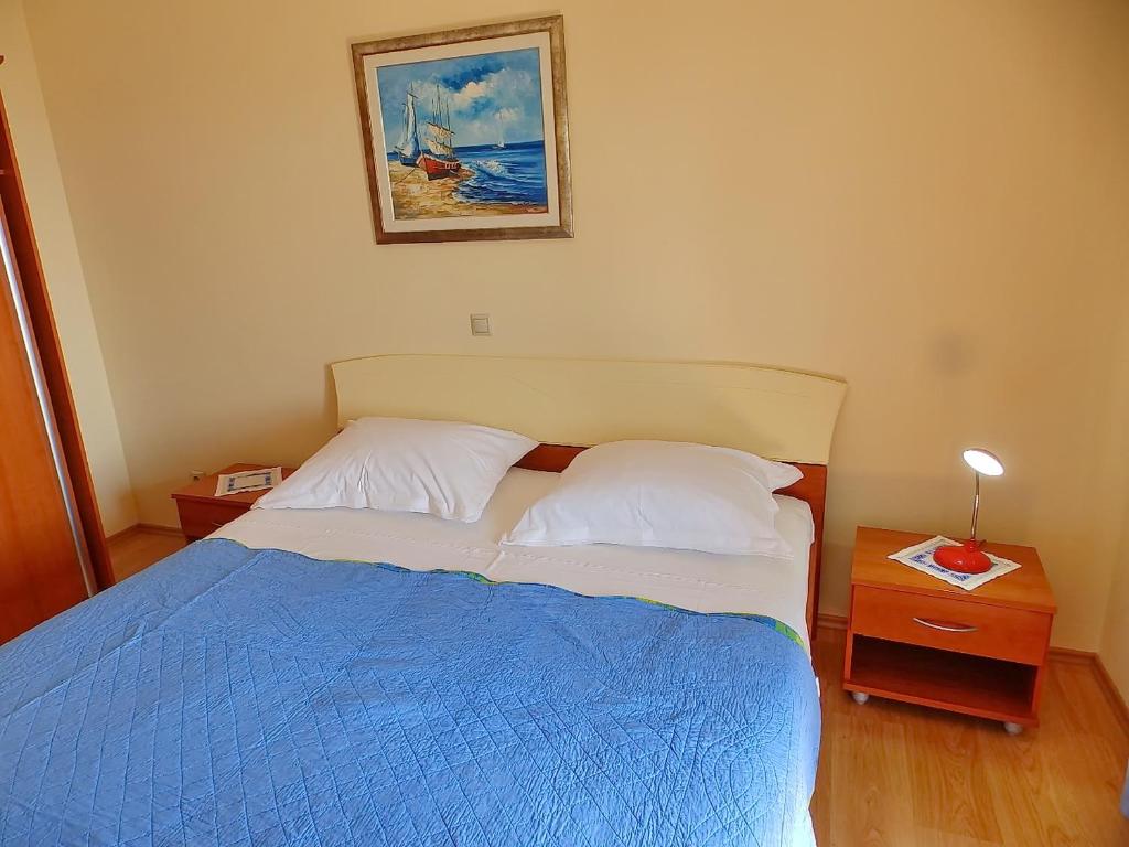 Posteľ alebo postele v izbe v ubytovaní Apartments Sunny Side Orebić