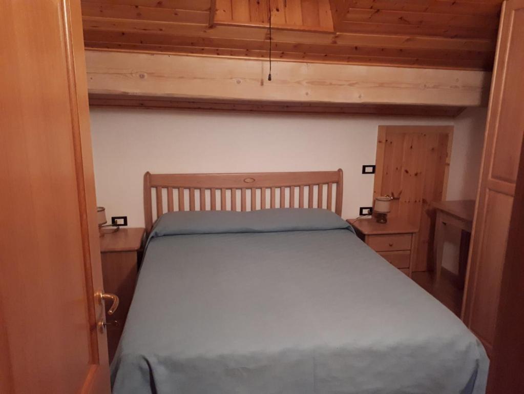 Postel nebo postele na pokoji v ubytování Casa Pergher