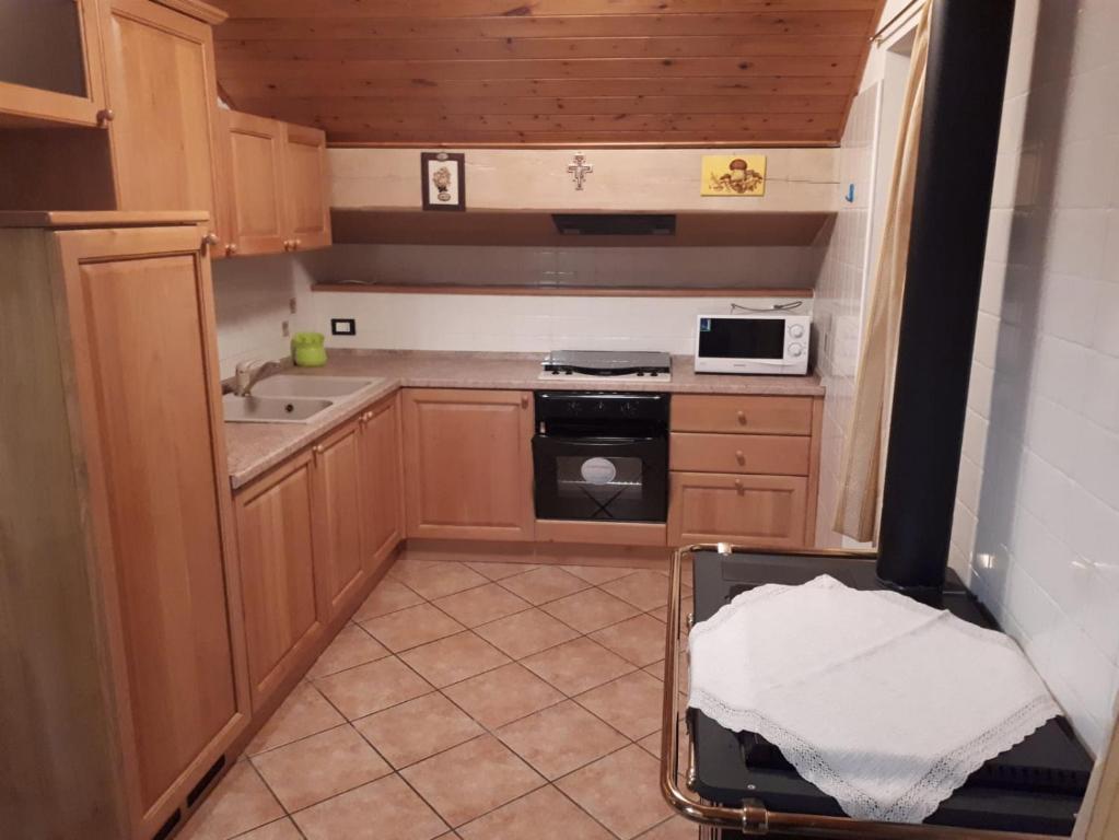 Kuchyň nebo kuchyňský kout v ubytování Casa Pergher
