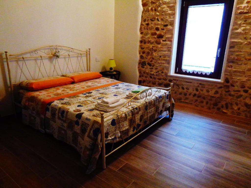 Letto o letti in una camera di B&B La Piazzetta