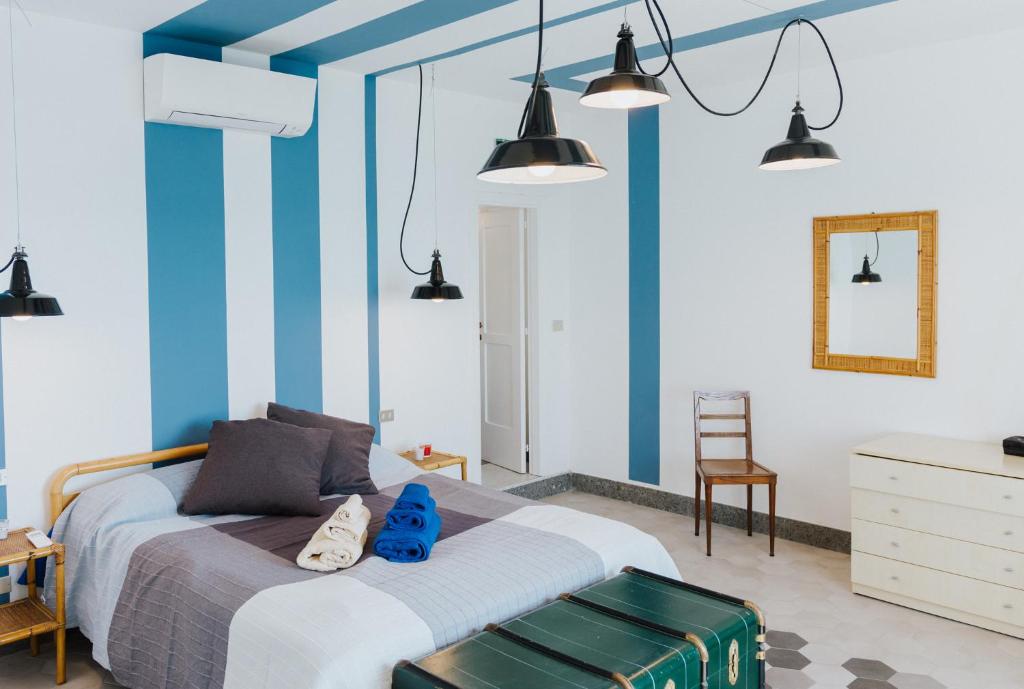 Posteľ alebo postele v izbe v ubytovaní La Concha Suites